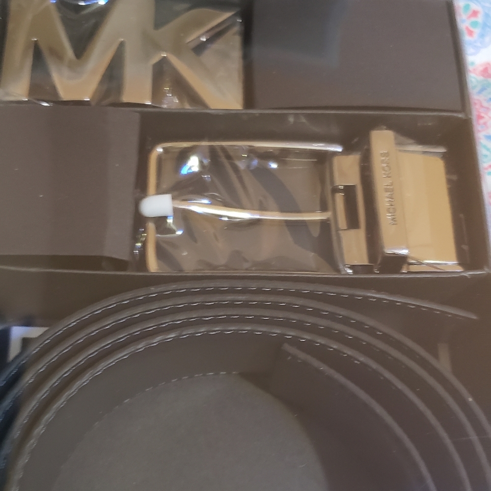 Brand new. Never opened Michael Kors belt